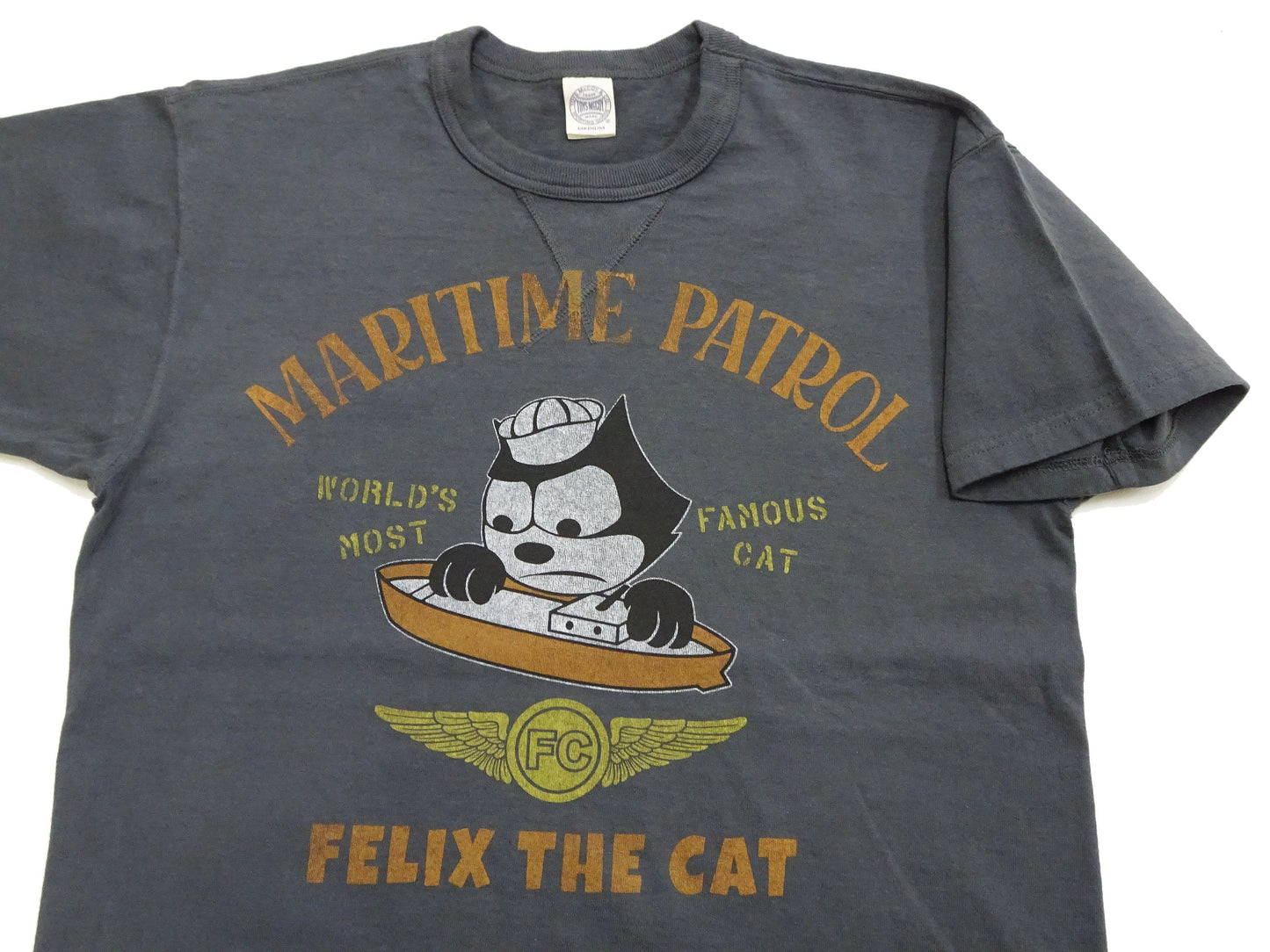 TOYS McCOY Men's Felix the Cat U.S. Navy Graphic Short Sleeve T-Shirt - Loopwheel Tubular Jersey, Garment Dyed, Made in Japan (TMC2601 030 Muted Black)